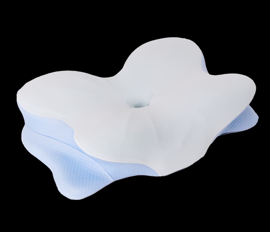 Contoured memory foam pillow photographed from above on a white background, showing the raised outer edges and the lower recessed centre